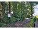 A private wooded walkway to beach and dock for homeowners only at 1003 Jervey Point Rd, Wando, SC 29492