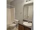 Well-lit bathroom features a shower-tub combo, neutral walls, and a modern vanity at 103 Dupont Way, Summerville, SC 29485