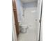 Bathroom features vinyl flooring, a walk-in shower, a new toilet, and wood cabinets at 103 Dupont Way, Summerville, SC 29485