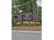 Oakbrook Commons sign featuring brick columns, landscaping, and community information at 103 Dupont Way, Summerville, SC 29485