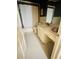 Neutral-toned bathroom featuring a toilet, vanity with countertop, and shower with curtain at 104 Silverhill Rd, Walterboro, SC 29488