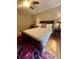 Comfortable bedroom features a wood sleigh bed, hardwood floors, and ceiling fan at 104 Silverhill Rd, Walterboro, SC 29488