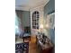 Dining room with china cabinet, lamp, side table, and classic decor at 104 Silverhill Rd, Walterboro, SC 29488