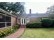 Brick home exterior with a brick path leading to double doors at 104 Silverhill Rd, Walterboro, SC 29488