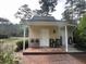 Charming garage with brick paver patio and convenient outdoor storage at 104 Silverhill Rd, Walterboro, SC 29488