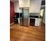 Kitchen with stainless refrigerator, white cabinetry, and dark countertops at 104 Silverhill Rd, Walterboro, SC 29488