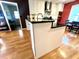 Modern kitchen island with black countertop and sink plus white cabinets at 104 Silverhill Rd, Walterboro, SC 29488
