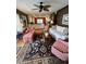 Large living room with wood floors, fireplace, and access to the kitchen at 104 Silverhill Rd, Walterboro, SC 29488