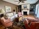 Inviting living room with fireplace, wood floors, and elegant decor at 104 Silverhill Rd, Walterboro, SC 29488