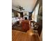 Cozy living room features wood floors, fireplace, and natural light at 104 Silverhill Rd, Walterboro, SC 29488