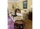 Comfortable living room with stylish seating, decor and area rug at 104 Silverhill Rd, Walterboro, SC 29488