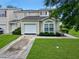 Charming townhouse with a one-car garage, well-manicured lawn and mature landscaping at 108 Spanish Oaks Ln, Ladson, SC 29456