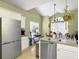 Well-equipped kitchen with stainless steel appliances, ample counter space, and a casual dining area nearby at 108 Spanish Oaks Ln, Ladson, SC 29456