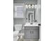 Well-lit bathroom with gray vanity, wood look flooring, and updated fixtures at 110 Instructor Ct, Ladson, SC 29456