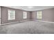 Spacious bonus room with three windows providing ample natural light at 110 Instructor Ct, Ladson, SC 29456