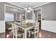 Open concept dining area with hardwood floors and updated lighting at 110 Instructor Ct, Ladson, SC 29456