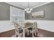 Bright dining area featuring hardwood floors and a modern chandelier at 110 Instructor Ct, Ladson, SC 29456