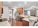 A kitchen with stainless steel appliances and hardwood floors at 110 Instructor Ct, Ladson, SC 29456