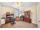 Bedroom featuring built-in bookcase, ceiling fan, and natural light at 116 Holbrook Ln, Goose Creek, SC 29445