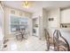 Bright kitchen nook with table and chairs, and a laundry closet at 116 Holbrook Ln, Goose Creek, SC 29445