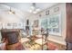 Cozy dining area featuring a glass table and chairs next to a window, adjacent to the living room at 116 Holbrook Ln, Goose Creek, SC 29445