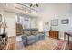 Bright living room featuring vaulted ceilings, a staircase, and a cozy seating area with a patterned rug at 116 Holbrook Ln, Goose Creek, SC 29445