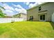 A large, well-maintained backyard with a fence, grill, and plenty of space for activities at 124 Bright Meadow Rd, Summerville, SC 29483
