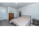 Comfortable bedroom with neutral tones, featuring ample closet space and a dresser for storage at 124 Bright Meadow Rd, Summerville, SC 29483