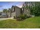 Beautiful two-story townhouse featuring a lush green lawn, perfect for relaxing and enjoying the outdoors at 124 Bright Meadow Rd, Summerville, SC 29483