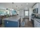 A kitchen island with a view of the open concept dining and living area at 124 Bright Meadow Rd, Summerville, SC 29483