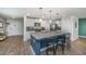 An open-concept kitchen featuring a large island with seating and plenty of storage space at 124 Bright Meadow Rd, Summerville, SC 29483