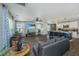 Spacious living room flows into kitchen, with hardwood floors and natural lighting at 124 Bright Meadow Rd, Summerville, SC 29483