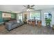 Bright living room featuring hardwood floors, neutral colors, and ceiling fan at 124 Bright Meadow Rd, Summerville, SC 29483