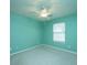 This carpeted bedroom features a ceiling fan and a window letting in natural light at 1304 Elm Hall Cir, Summerville, SC 29483