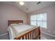 Bedroom featuring a neutral color scheme, ceiling fan, and a window with blinds at 1304 Elm Hall Cir, Summerville, SC 29483