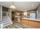 Contemporary kitchen with white appliances, granite countertops, and stylish wood cabinetry at 1304 Elm Hall Cir, Summerville, SC 29483