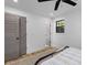 Bedroom featuring wood floors, neutral paint, and walk-in closet at 1320 Bresee St, Charleston, SC 29412