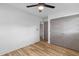 Bright bedroom features a modern ceiling fan and spacious closet with light wood vinyl flooring at 1320 Bresee St, Charleston, SC 29412