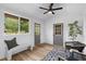 Bright bonus room with ample light, gray doors and modern decor at 1320 Bresee St, Charleston, SC 29412