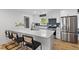 Modern kitchen features a quartz countertop island, stainless appliances, and stylish finishes at 1320 Bresee St, Charleston, SC 29412
