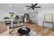 Bright open floor plan with a modern kitchen, dining area and cozy living room at 1320 Bresee St, Charleston, SC 29412