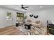 Cozy living room with large windows and stylish decor throughout at 1320 Bresee St, Charleston, SC 29412