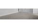 Bright carpeted bedroom with white baseboards and trim, as well as a large closet at 135 Lilac Grove Way, Summerville, SC 29486