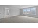 Large bedroom with plush carpeting and lots of light coming from multiple windows at 135 Lilac Grove Way, Summerville, SC 29486