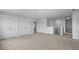 Spacious room with carpet, recessed lighting and several doors for closet and hallway access at 135 Lilac Grove Way, Summerville, SC 29486