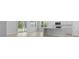 Open-concept living space with a kitchen island and sliding glass doors to the backyard at 139 Lilac Grove Way, Summerville, SC 29486