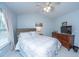 Comfortable bedroom featuring a queen-sized bed, dresser, and a ceiling fan at 1401 Elm Hall Cir, Summerville, SC 29483