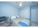 Comfortable bedroom with a ceiling fan, natural light, and ample space at 1401 Elm Hall Cir, Summerville, SC 29483