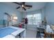 Well-lit craft room with sewing machines, cutting table, and creative workspace at 1401 Elm Hall Cir, Summerville, SC 29483