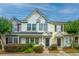 Inviting townhome exterior with manicured landscaping and traditional architectural details at 1401 Elm Hall Cir, Summerville, SC 29483